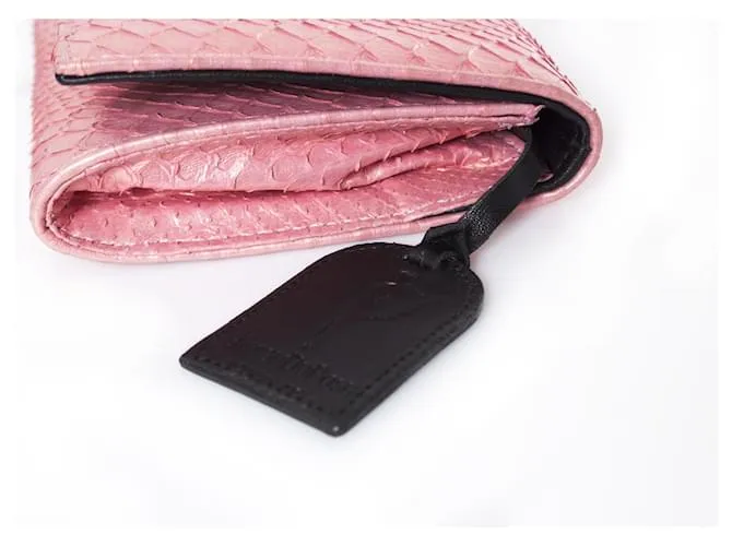 Autre Marque Casa Du Posh, Clutch con calavera piercing de pitón rosa. 