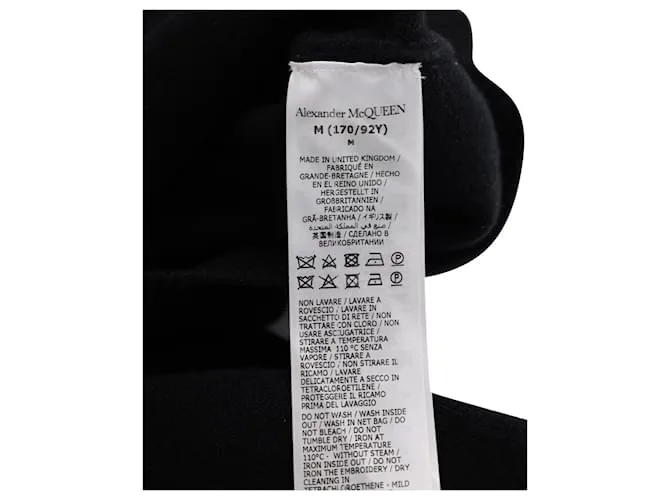Jersey corto de punto con broche en cachemir negro de Alexander McQueen 