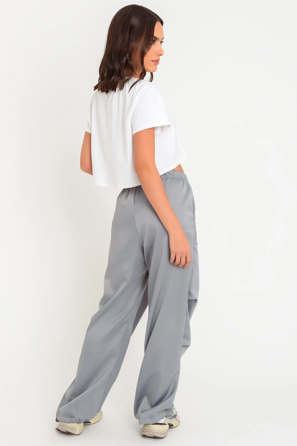 Pantalón parachute satinado de cintura alta elástica